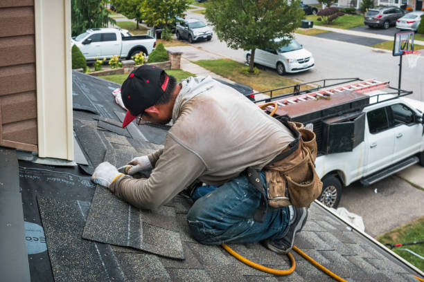 Professional Emergency Roof Repair technician working in Holbrook, MA